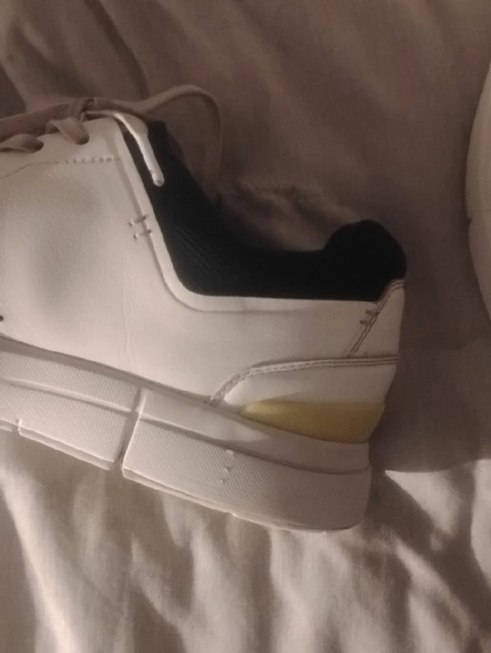 On Running The Roger Navy And White With Yellow Accents Size 11.5